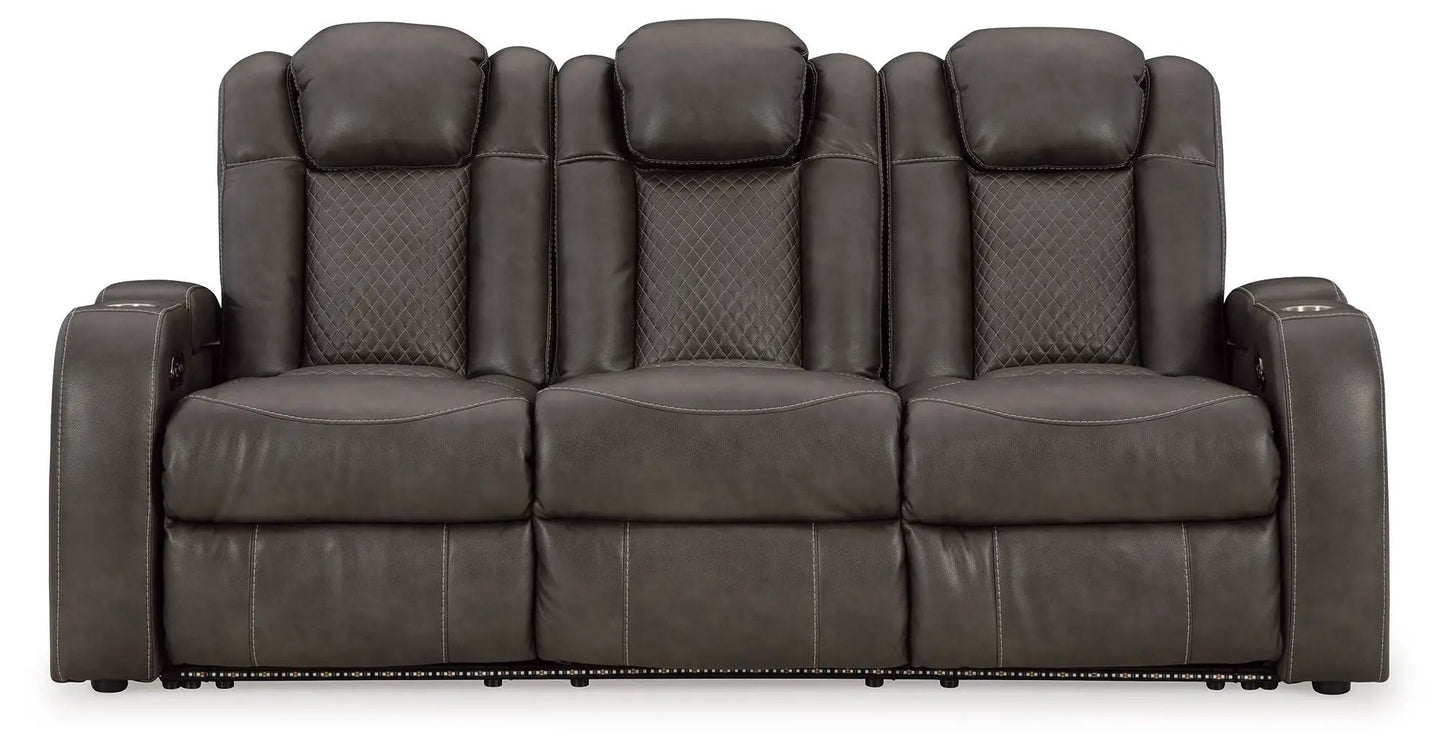 Fyne-dyme power reclining sofa with adj headrest in dark brown leather diamond-quilted back on Tampa Home & Garden Store