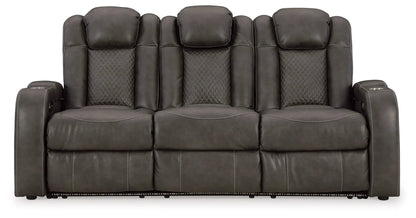 Fyne-dyme power reclining sofa with adj headrest in dark brown leather diamond-quilted back on Tampa Home & Garden Store