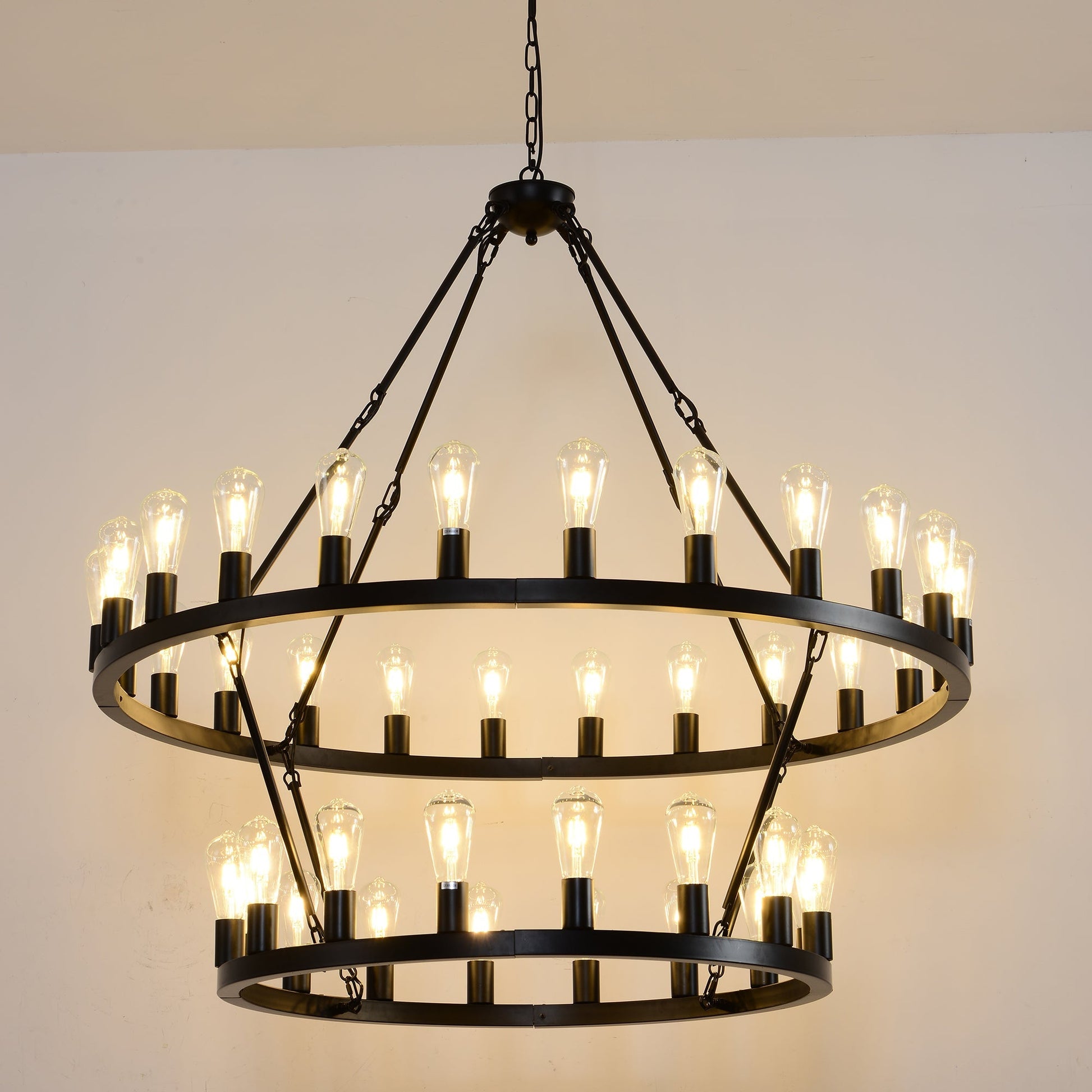 47.24 Inch matte black wagon wheel chandelier with 36 Edison bulbs, circular frame and candle-style sockets on Tampa Home & Garden Store
