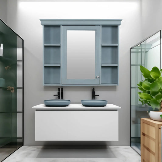 Blue wall-mounted medicine cabinet with mirror and open side shelves above a white vanity on Tampa Home & Garden Store