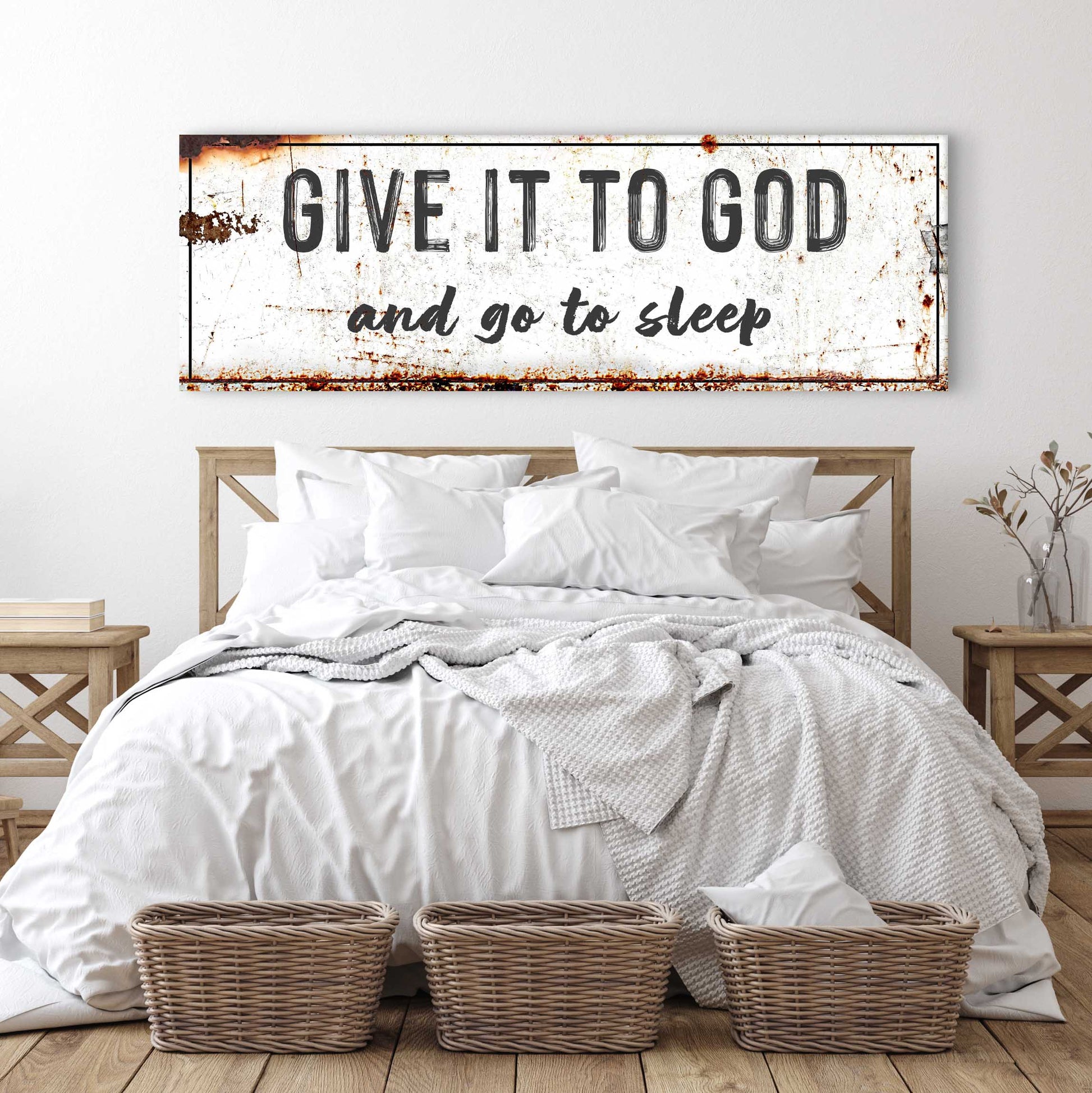 Canvas sign Give It To God And Go To Sleep with distressed white, rust accents above a bed on Tampa Home & Garden Store