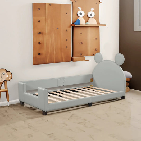 Twin size grey upholstered daybed with headboard and low arms, slatted bed base visible on Tampa Home & Garden Store