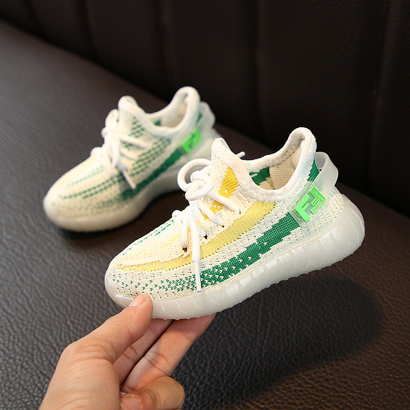 Stevvex baby/toddler sneakers pair with white knit upper and yellow accents on Tampa Home & Garden Store