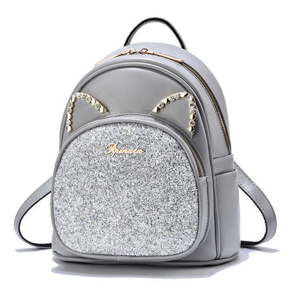 Stevvex gray PU leather backpack with glitter front pocket and cat-ear studded accents on Tampa Home & Garden Store