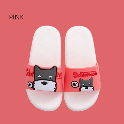 Kids pink dog slide sandals with white soles and Schnauzer graphic pair on backdrop on Tampa Home & Garden Store