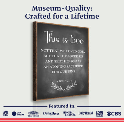 Canvas faith sign This Is Love 1 John 4:10 with chalkboard style text and wood frame on Tampa Home & Garden Store
