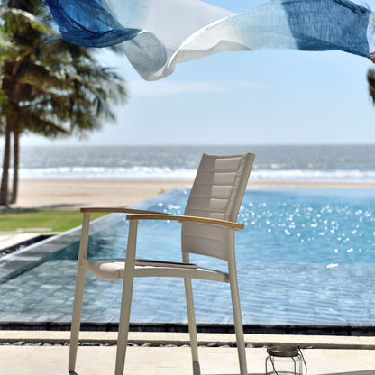 Portals Light Lite 2pc Stacking Armchair beige outdoor chair with wooden armrests poolside on Tampa Home & Garden Store