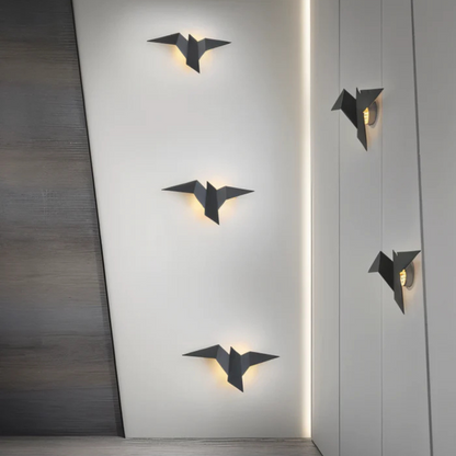 Origami LED Wall Lamp Moktan Sabai; 6 black origami bird wall lights with warm glow on wall on Tampa Home & Garden Store