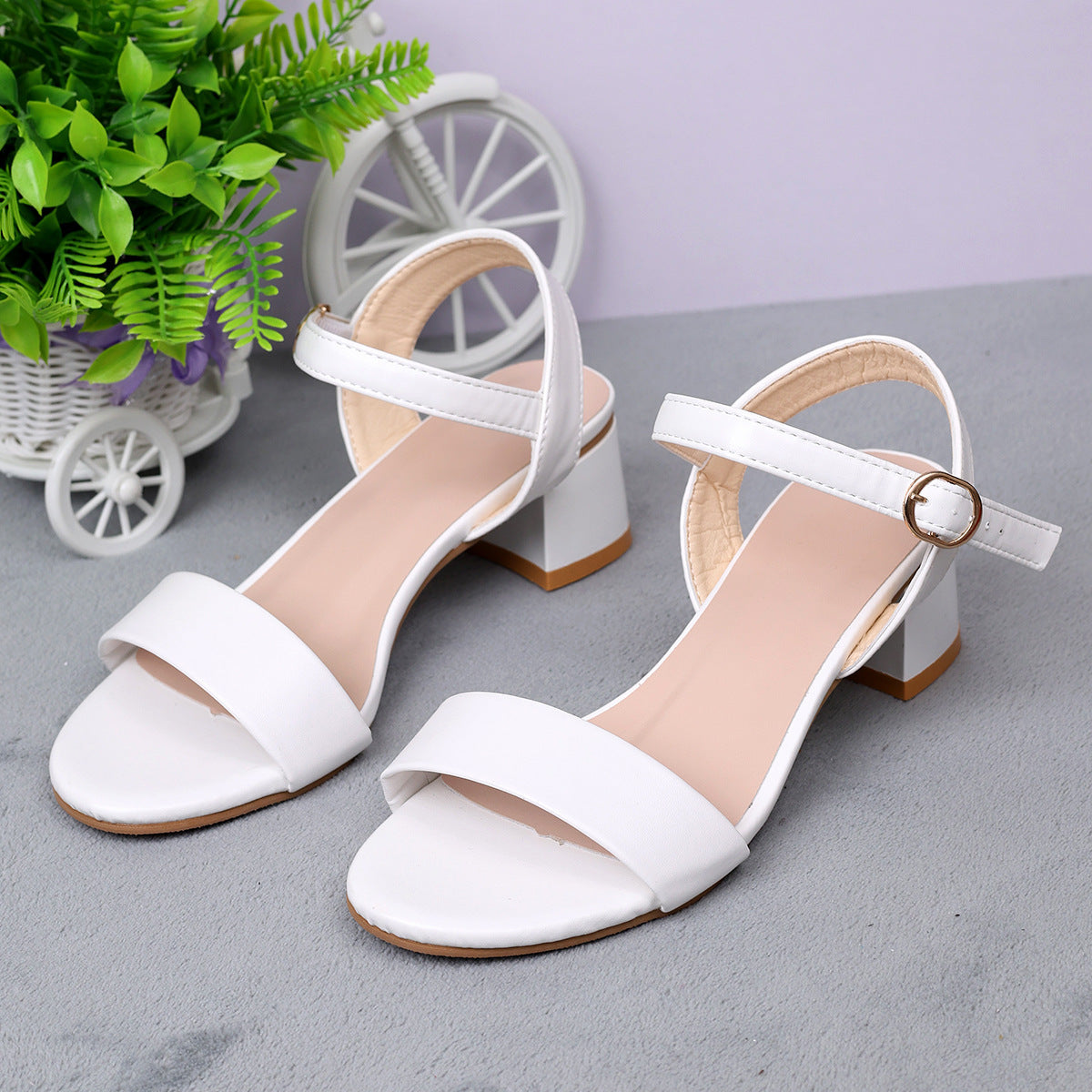 Women Stevvex white leather sandals with ankle strap, open toe, low block heel pair on Tampa Home & Garden Store