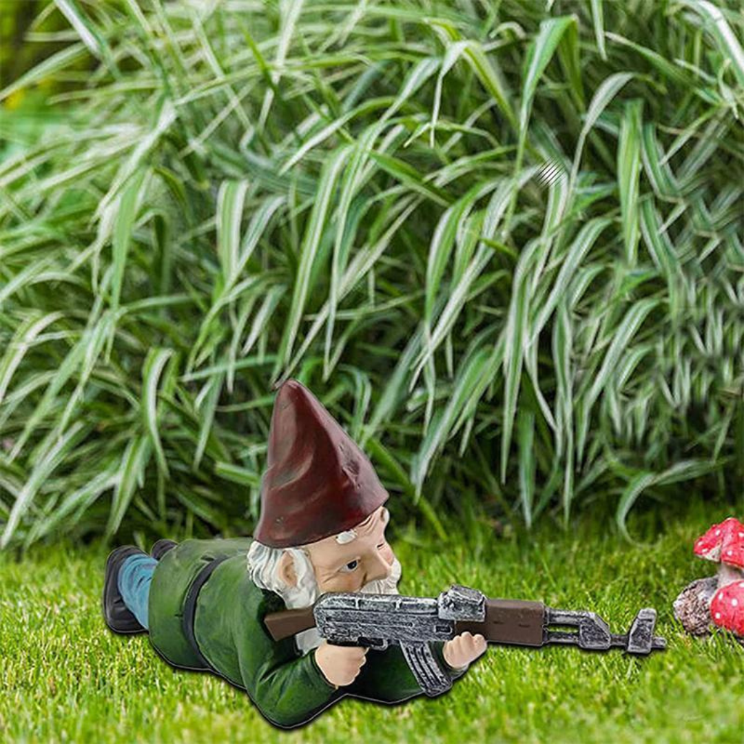 Military Garden Gnome Statue lying prone with rifle, green outfit Moktan Sabai garden sculpture on Tampa Home & Garden Store