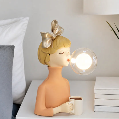 Parisian Bubble Girls clear glass LED table lamp with a blonde girl bust and silver bow on Tampa Home & Garden Store