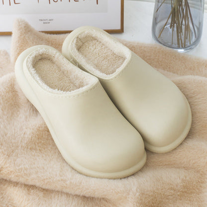 Pair of women's ivory plush memory-foam slippers with thick sole for indoor use on Tampa Home & Garden Store
