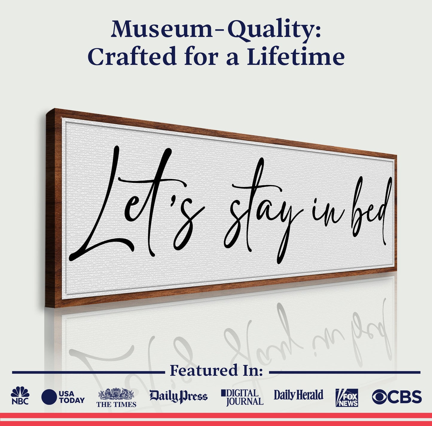 Let's Stay in Bed canvas sign by Tailored Canvases on frame with black script lettering on Tampa Home & Garden Store