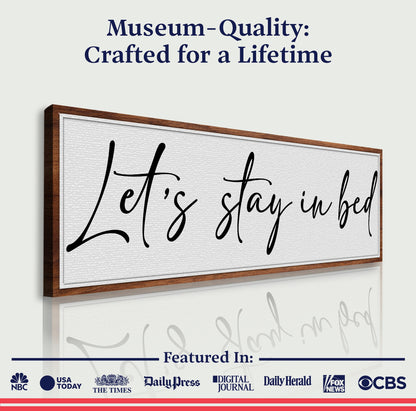 Let's Stay in Bed canvas sign by Tailored Canvases on frame with black script lettering on Tampa Home & Garden Store