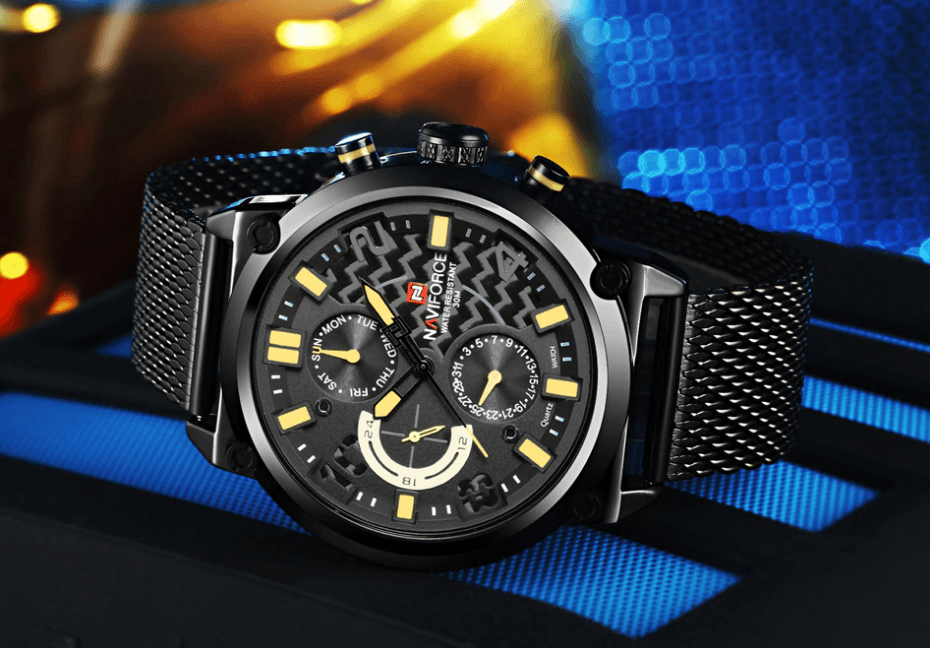 Men's analog quartz watch by Stevvex with stainless steel mesh band, black dial, yellow indices on Tampa Home & Garden Store