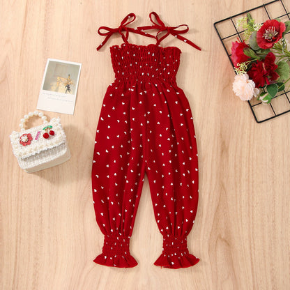 Stevvex red baby romper jumpsuit with white heart print, sleeveless smocked top and tie straps on Tampa Home & Garden Store