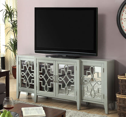 Kacia Console Cabinet by HouseOfZazla, light gray cabinet with mirrored fretwork doors under TV on Tampa Home & Garden Store