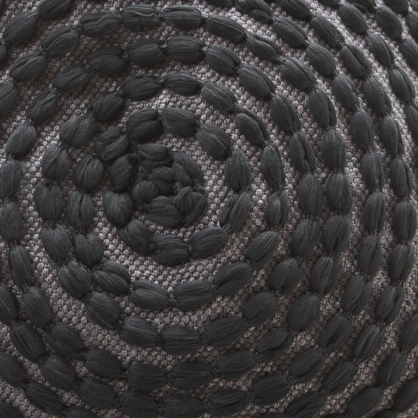 River Handcrafted Cylindrical Pouf with black rope texture on gray weave base on Tampa Home & Garden Store