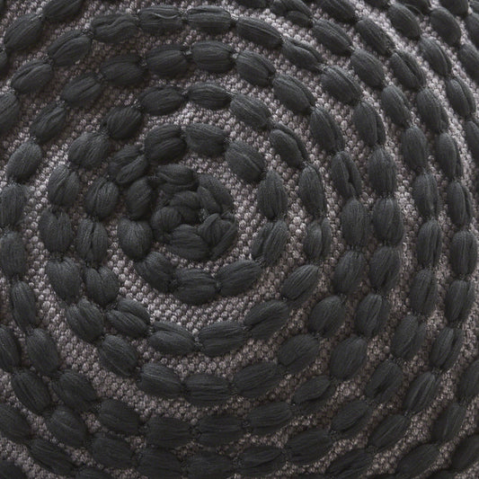 River Handcrafted Cylindrical Pouf with black rope texture on gray weave base on Tampa Home & Garden Store