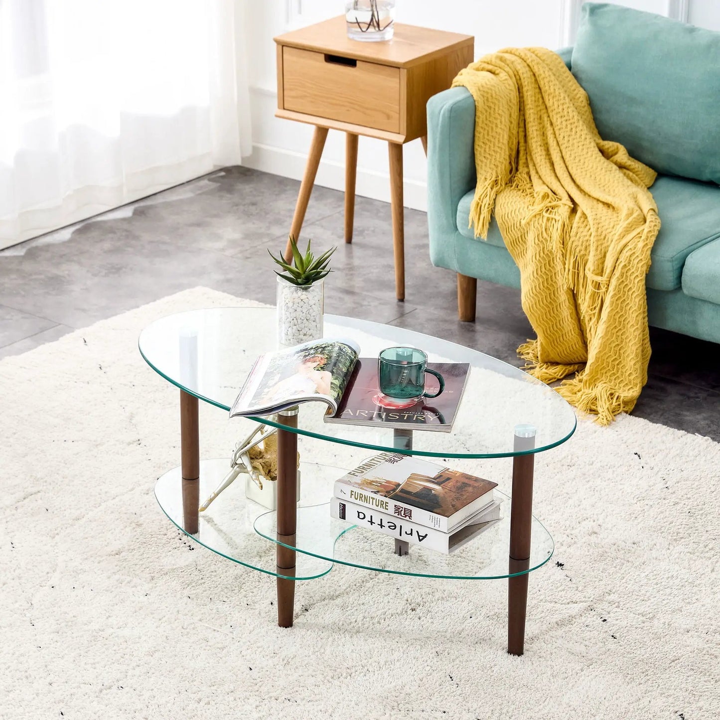 Transparent oval glass coffee table with oak legs and three-tier glass by Unique Piece Furniture on Tampa Home & Garden Store