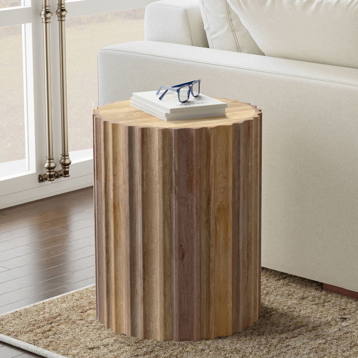 Rolf Side Table by HouseOfZazla; round natural wood pedestal with fluting beside a cream sofa on Tampa Home & Garden Store