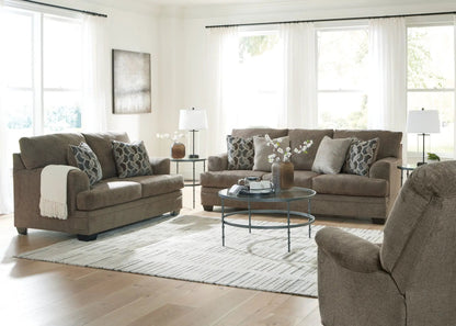 Stonemeade 3 Piece Living Room Set Unique Piece Furniture taupe fabric with geometric pillows on Tampa Home & Garden Store