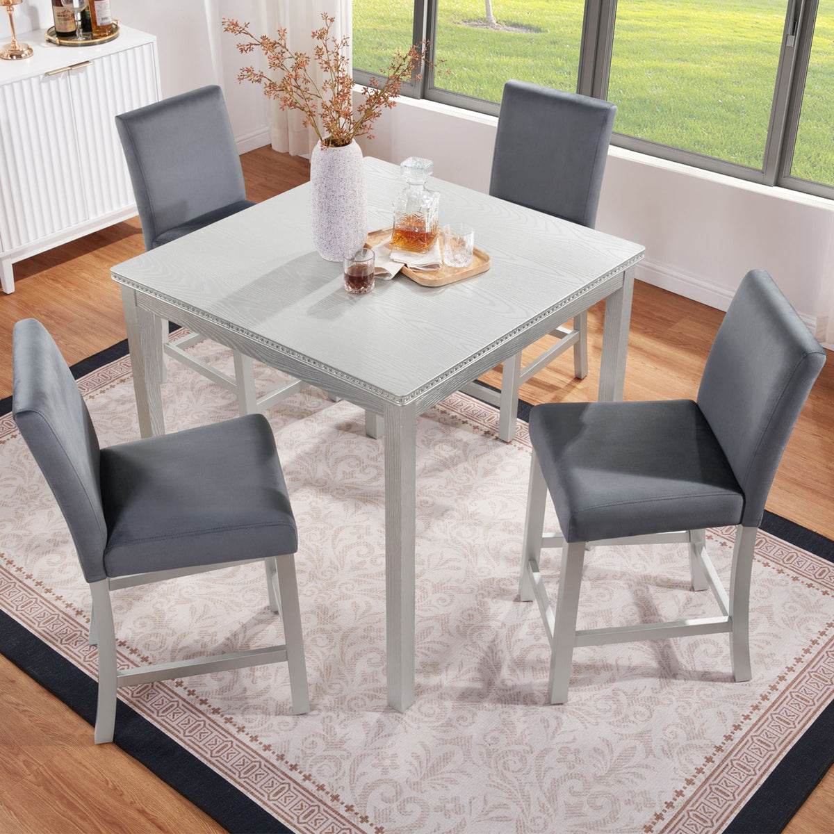 5-piece counter-height dining set with square gray wood table and four gray upholstered chairs on Tampa Home & Garden Store
