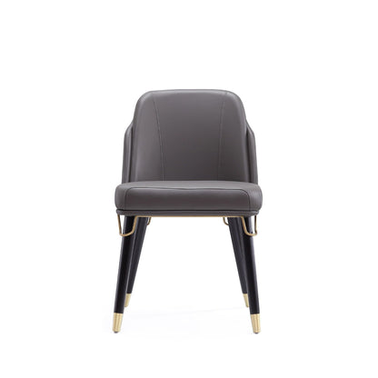 Estelle Dining Chair with Metal Accents dark gray faux leather, gold-tipped legs HouseOfZazla on Tampa Home & Garden Store