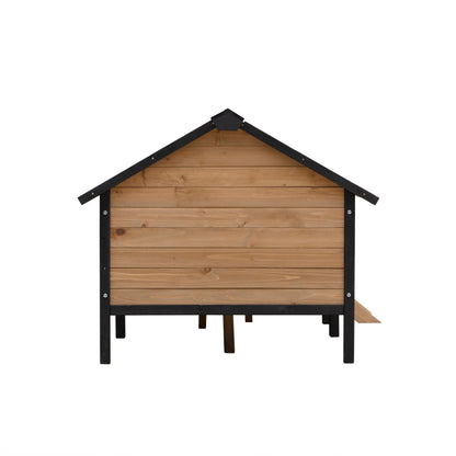 Outdoor wooden cabin style dog kennel with porch, natural wood panels and black trim on Tampa Home & Garden Store