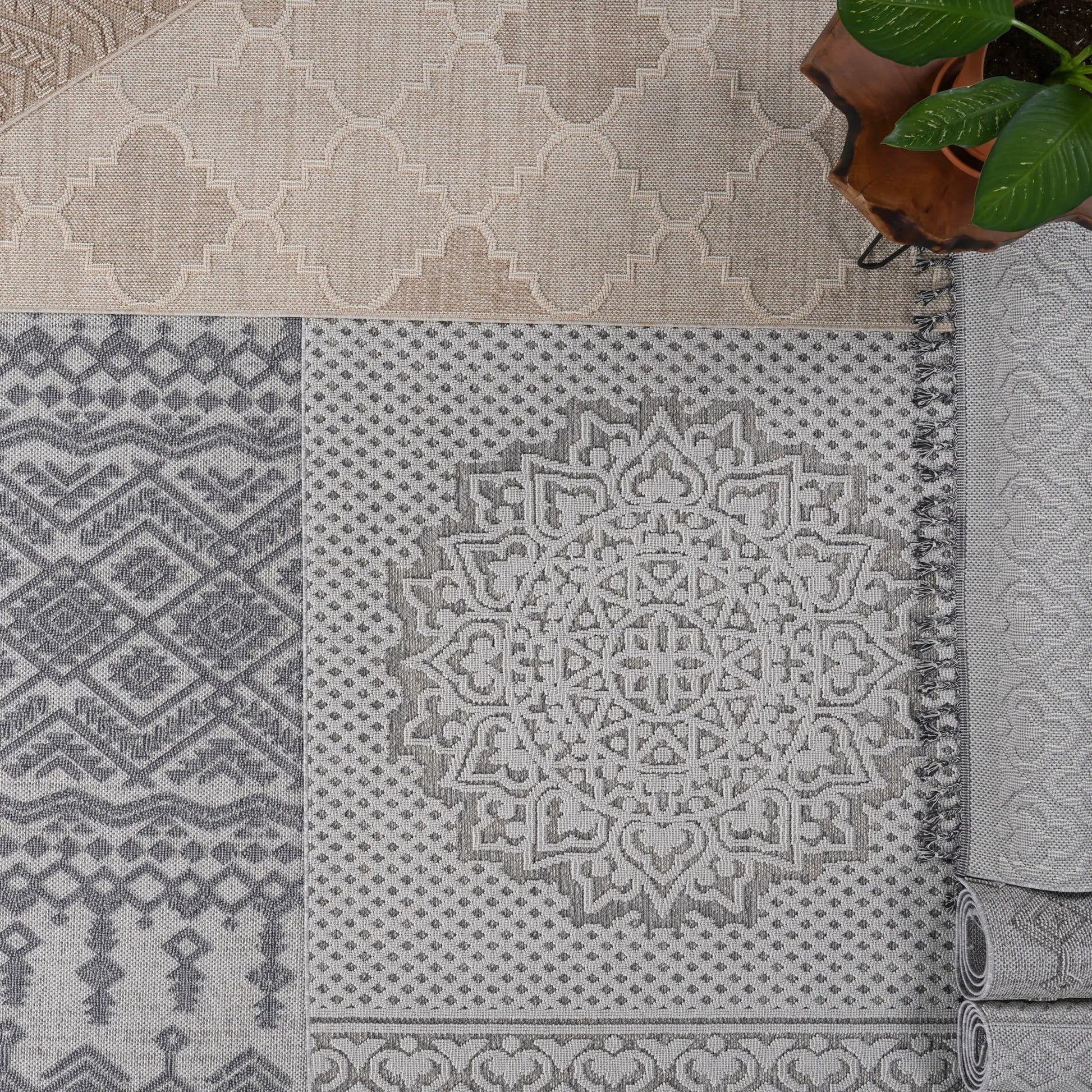 Guros traditional indoor outdoor area rug in greyscale with patchwork geometric patterns on Tampa Home & Garden Store