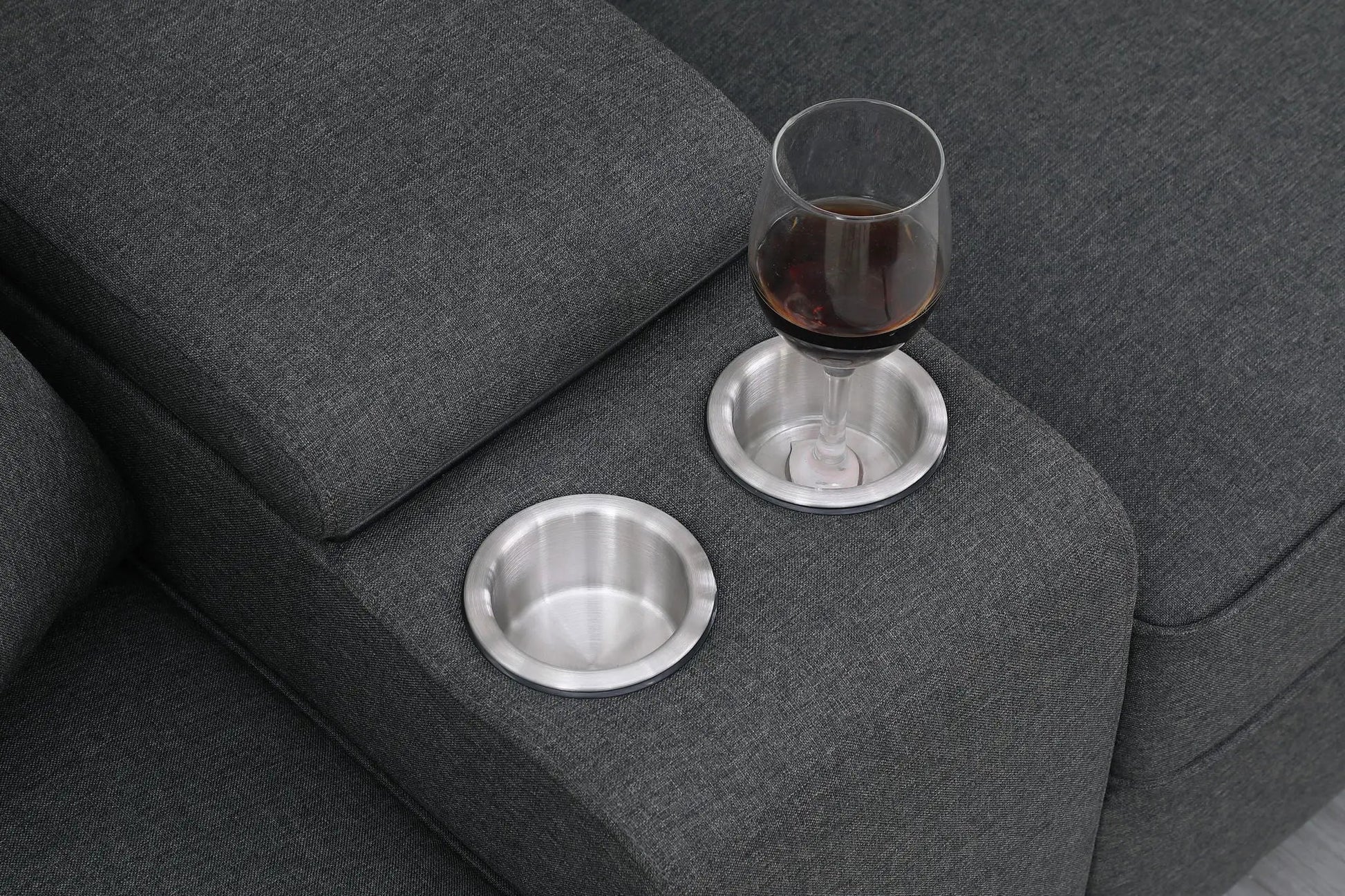 Eric 9-Piece Upholstered Sectional With Ottoman gray fabric with wine glass on coasters on Tampa Home & Garden Store