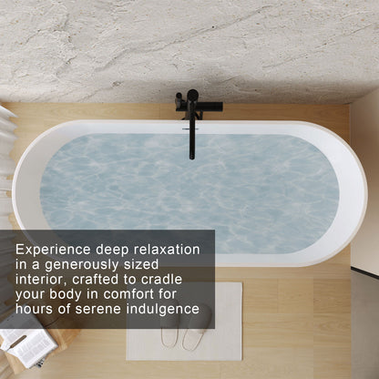 Glossy white freestanding bathtub with black toe-tap drain and faucet by HouseOfZazla on Tampa Home & Garden Store