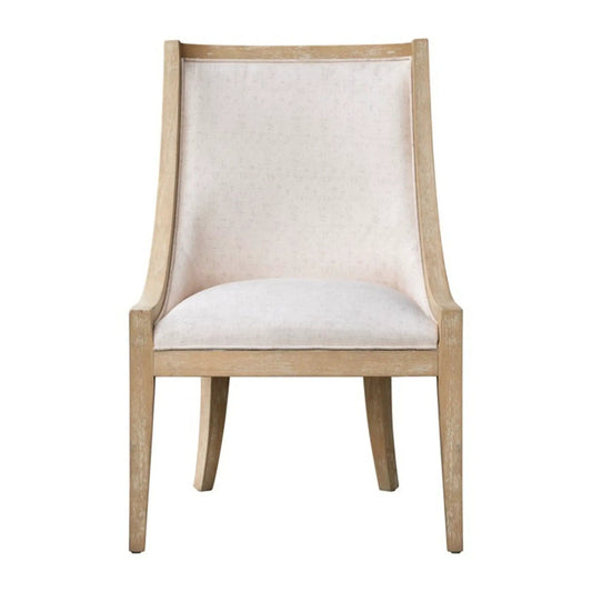 Upholstered dining chair with nailhead trim, beige fabric, natural wood legs on Tampa Home & Garden Store