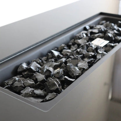 Outdoor fire pit table with lid in dark gray, lava rock bed on Tampa Home & Garden Store