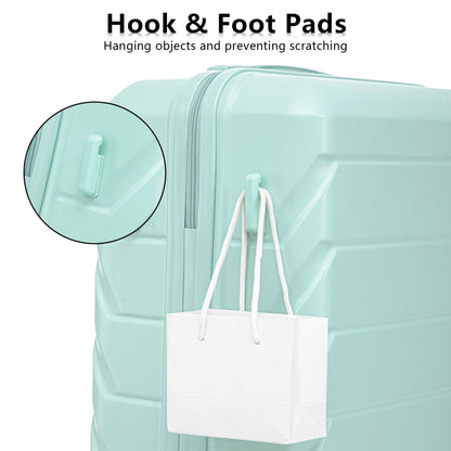 Spinner wheel luggage by HouseOfZazla mint green with white rope-handled shopping bag on Tampa Home & Garden Store