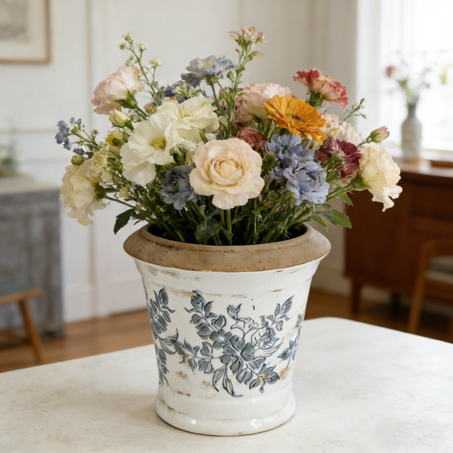 Ceramic planter set of 2 featuring blue floral pattern on white glaze by HouseOfZazla on Tampa Home & Garden Store