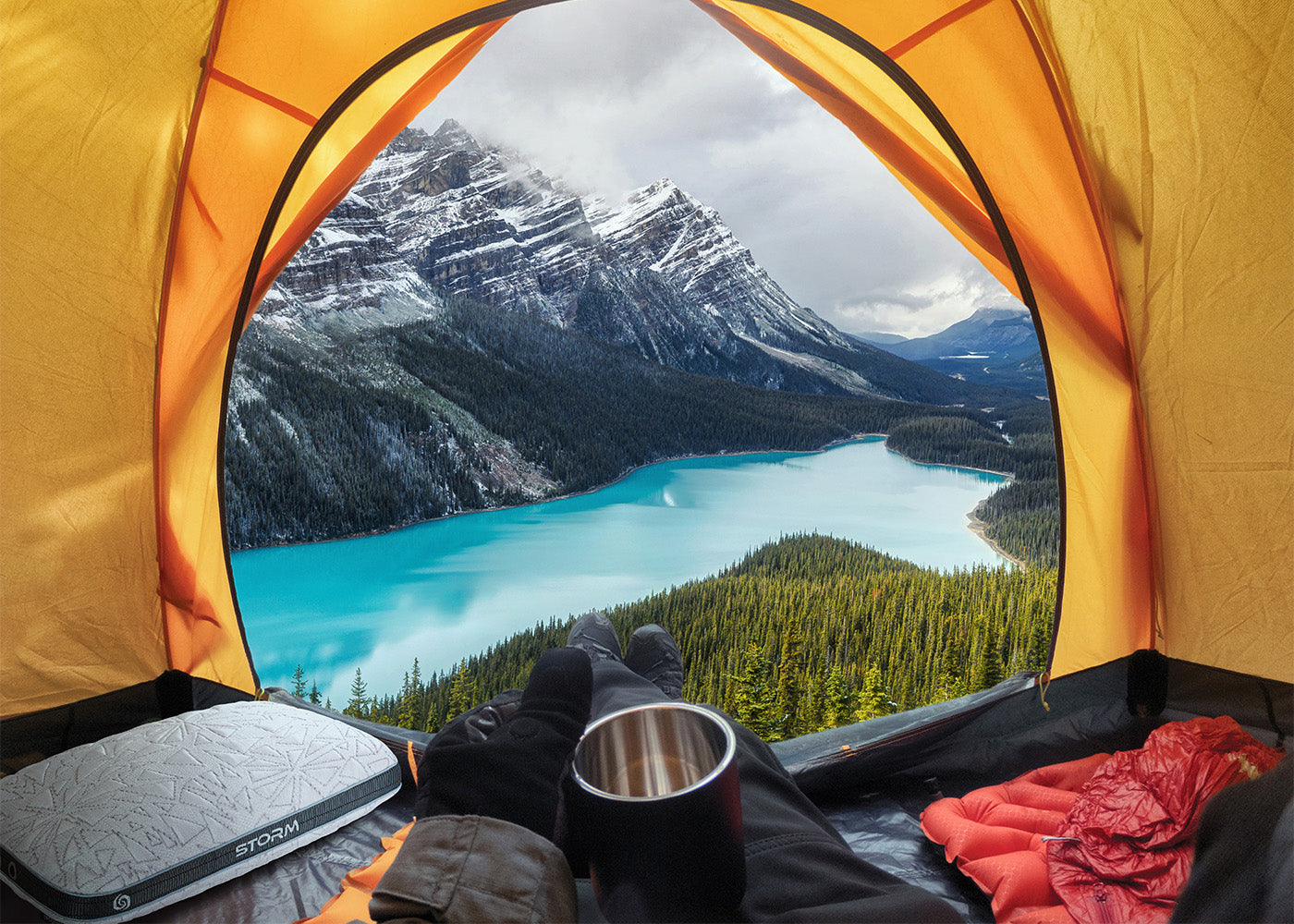 BedGear Storm Travel Pillow, gray backrest pillow inside orange tent with turquoise lake on Tampa Home & Garden Store
