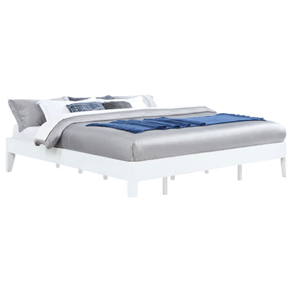 Hounslow platform bed by HouseOfZazla white frame with gray bedding and blue throw on Tampa Home & Garden Store