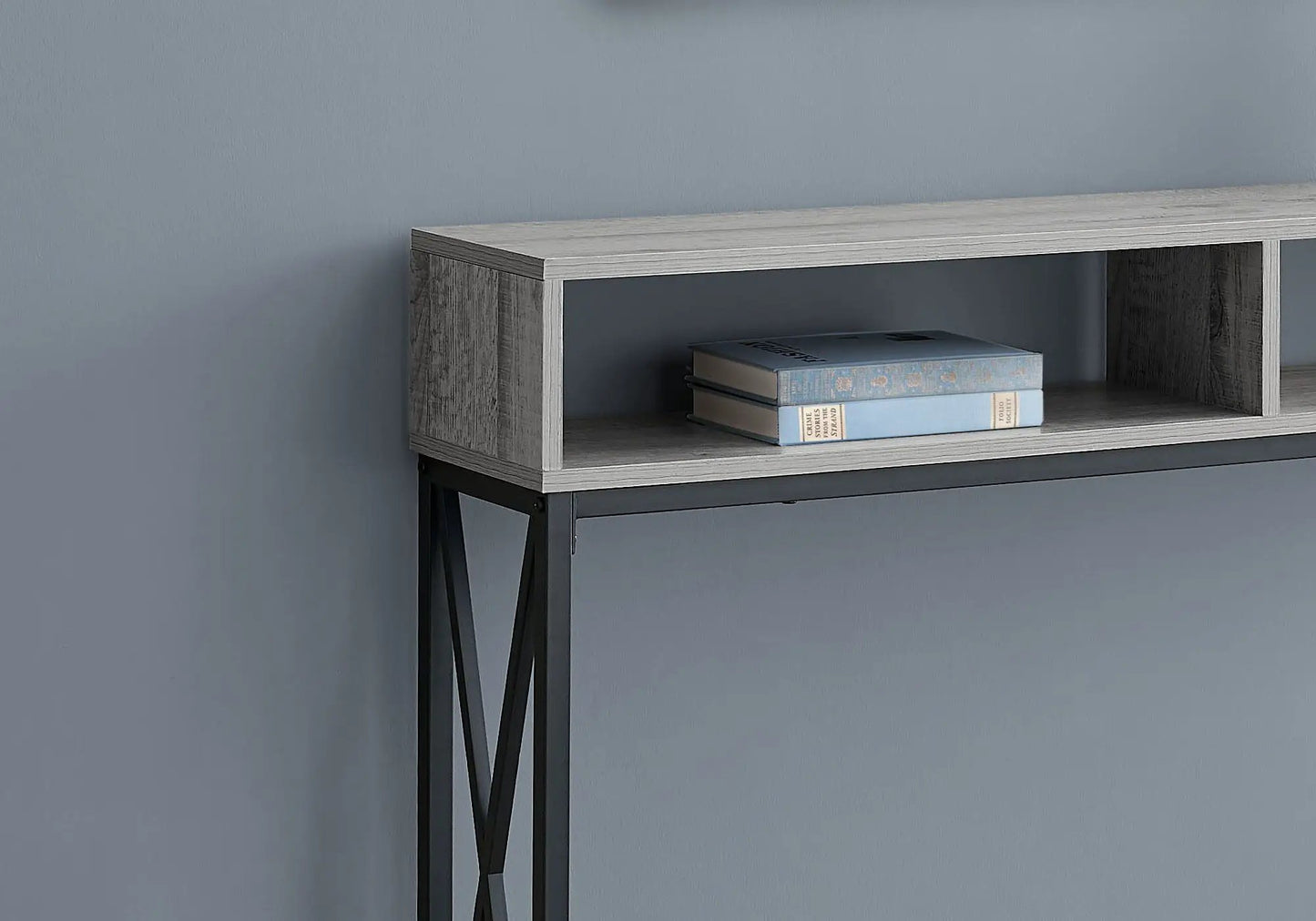 Accent console table for entryway in gray wood with black metal legs; shelf with blue books on Tampa Home & Garden Store