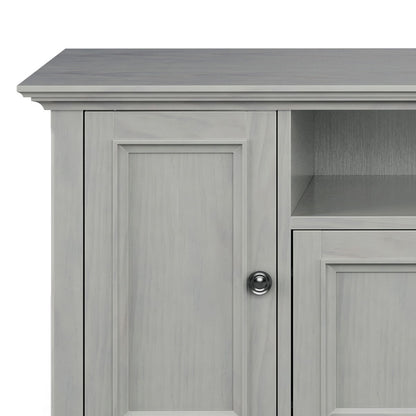 Wide TV Stand in solid light gray wood with raised-panel doors and open shelf on Tampa Home & Garden Store