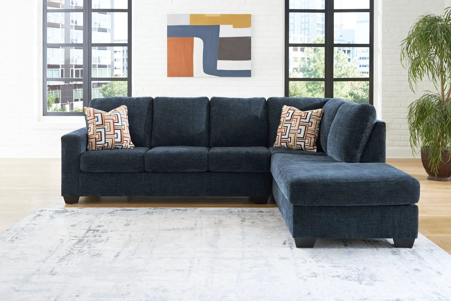 Aviemore Stationary Sectional by Unique Piece Furniture in blue upholstery with chaise on Tampa Home & Garden Store