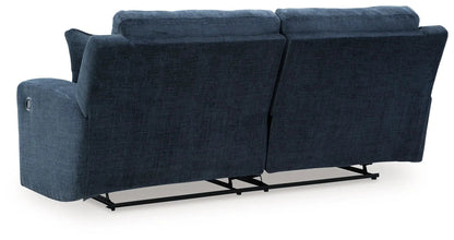 Danum 2-seat reclining sofa in blue textured fabric with dual recliners and exposed metal base on Tampa Home & Garden Store