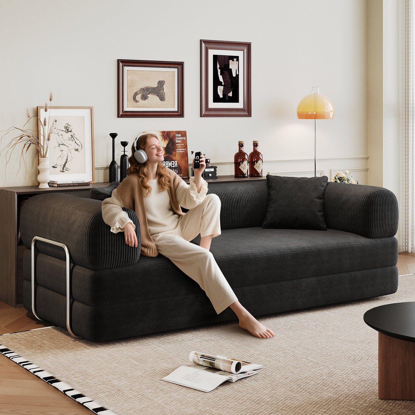 Black corduroy convertible sofa bed with pillow back and armrests for living room on Tampa Home & Garden Store
