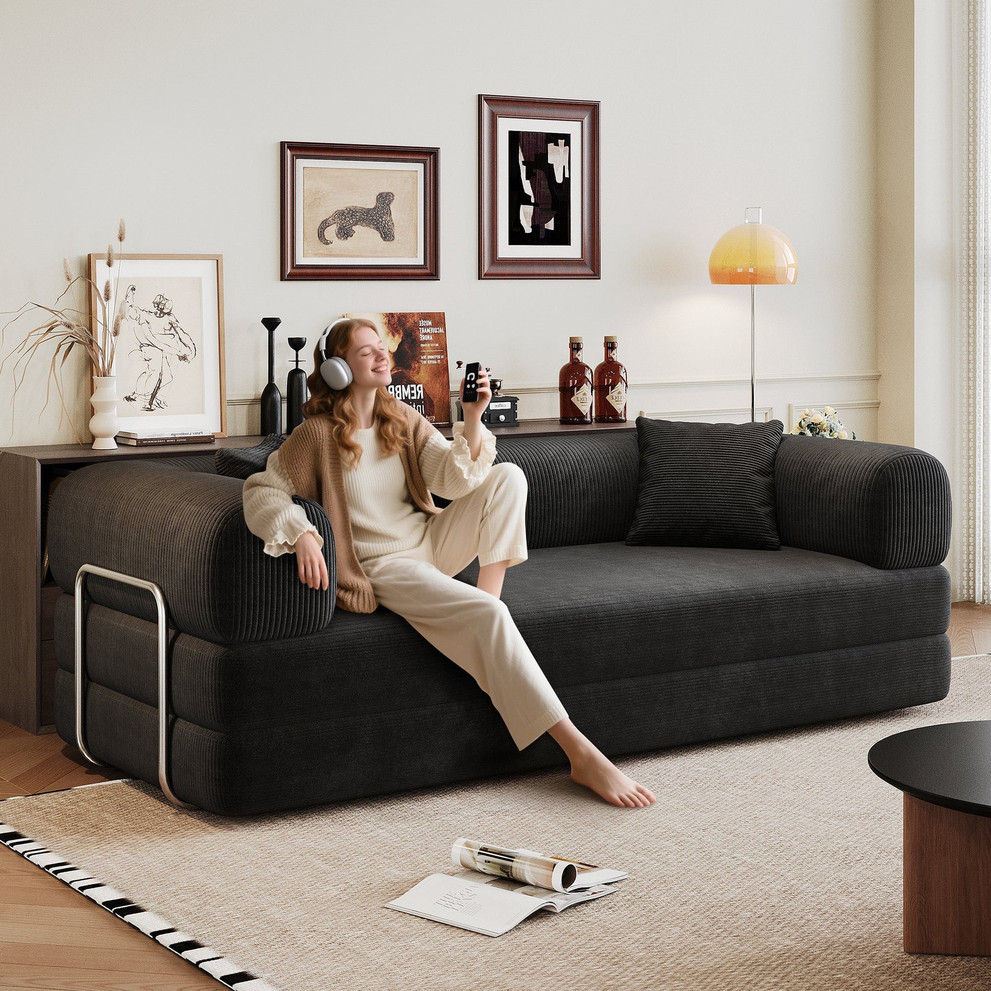 Black corduroy convertible sofa bed with pillow back and armrests for living room on Tampa Home & Garden Store