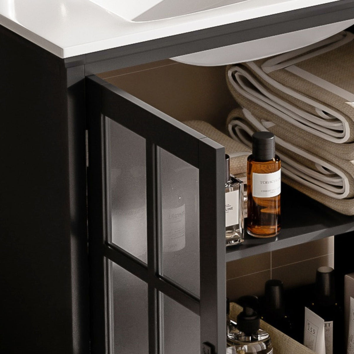 Modern bathroom vanity with ceramic sink and tempered blurred glass doors in dark wood finish on Tampa Home & Garden Store