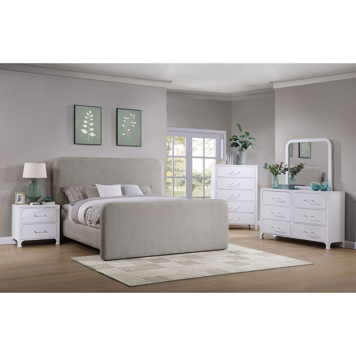Kendra platform bed with gray upholstered headboard in a bright bedroom with white dressers on Tampa Home & Garden Store