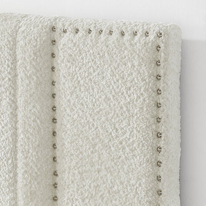 Queen size upholstered bed by HouseOfZazla with white faux fur fabric and channel tufting on Tampa Home & Garden Store