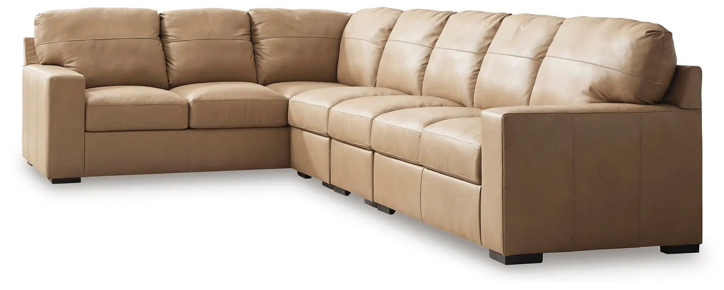 Bandon Sectional tan leather sofa by Unique Piece Furniture with plush cushions and dark feet on Tampa Home & Garden Store