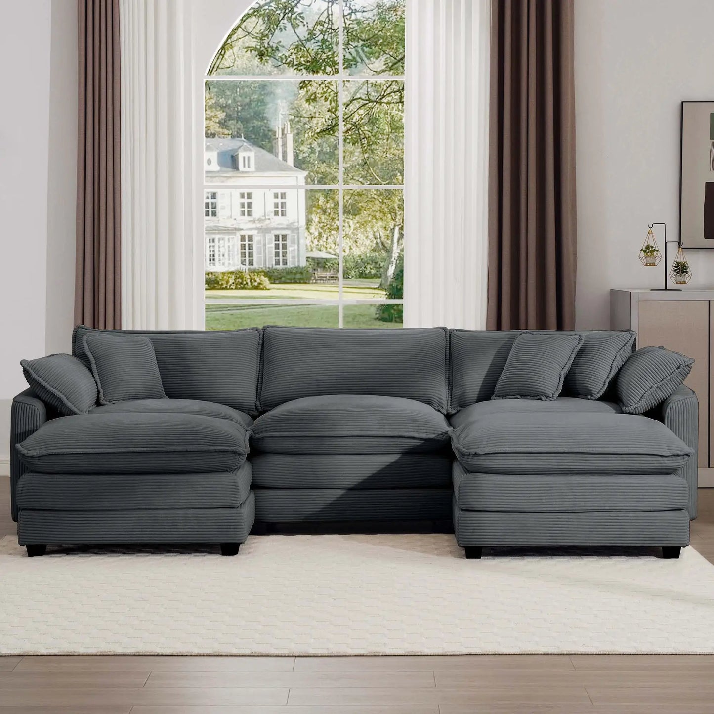 Oversized modular cushion sofa in gray fabric with low back and deep seating, sectional on Tampa Home & Garden Store