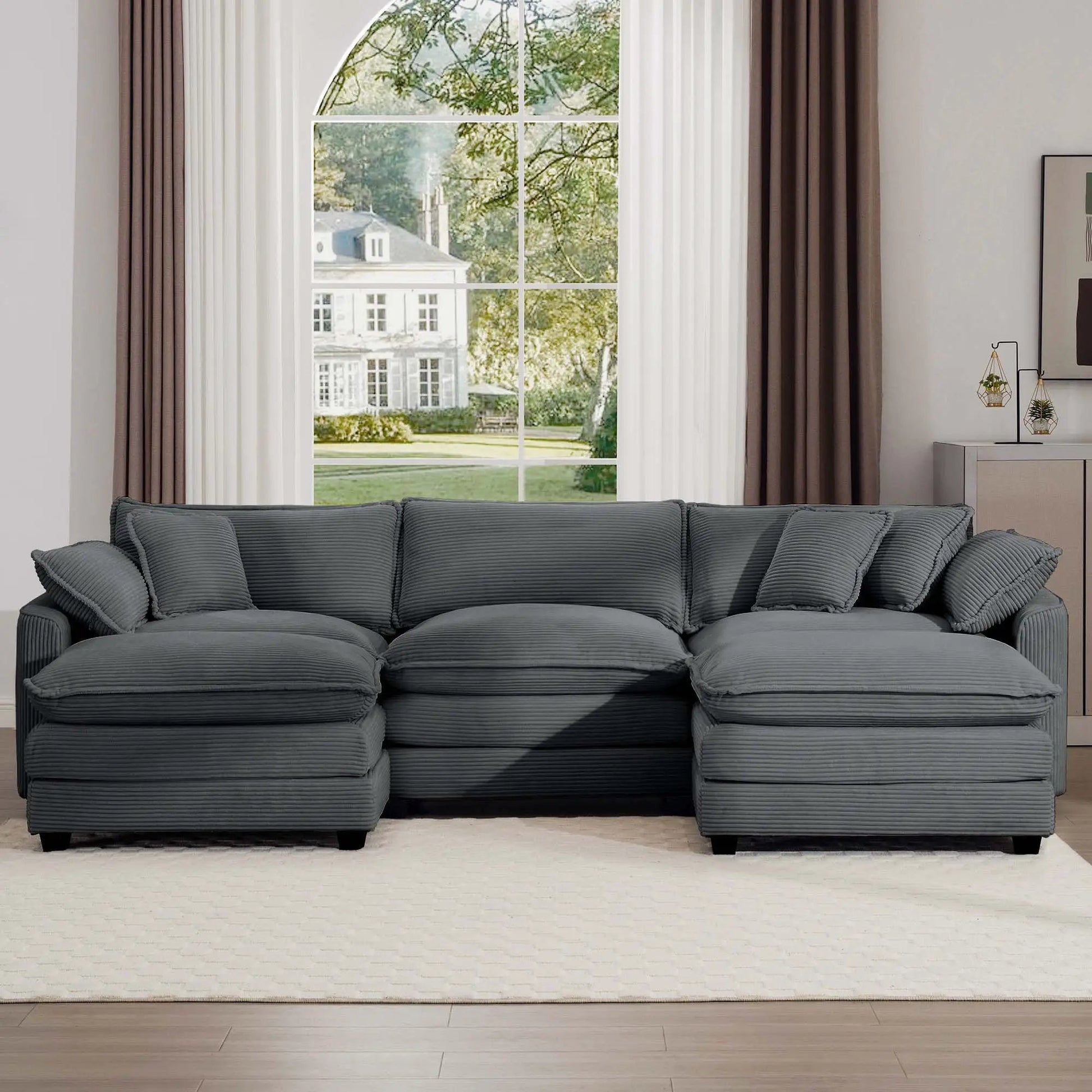 Oversized modular cushion sofa in gray fabric with low back and deep seating, sectional on Tampa Home & Garden Store
